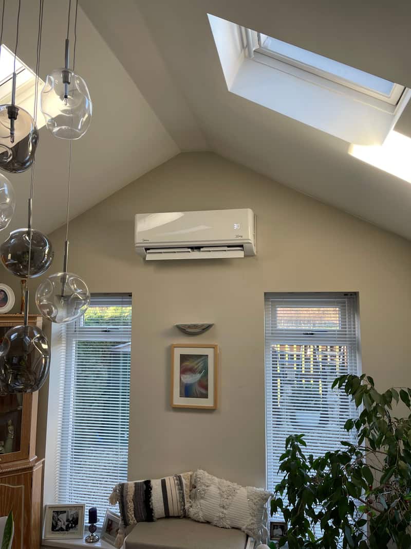 Wall-mounted air conditioning unit installed in a vaulted lounge in Newcastle upon Tyne