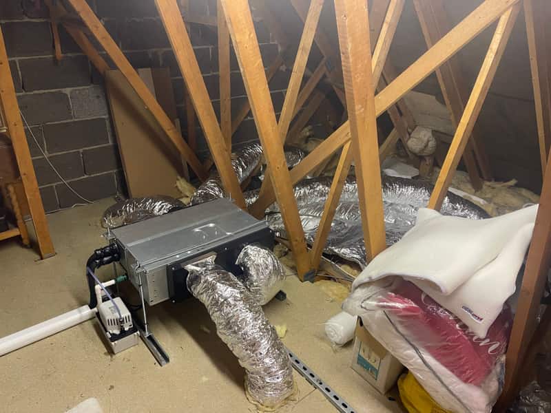 Ducted air conditioning unit being installed in a loft in Newcastle upon Tyne