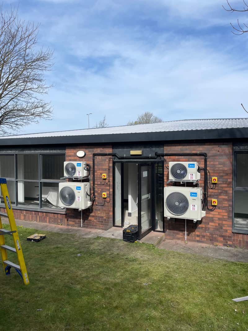 Multi-split outdoor air conditioning units on an office building in Newcastle upon Tyne